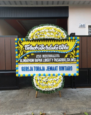 Papan Bunga Duka di Bontang Lestari